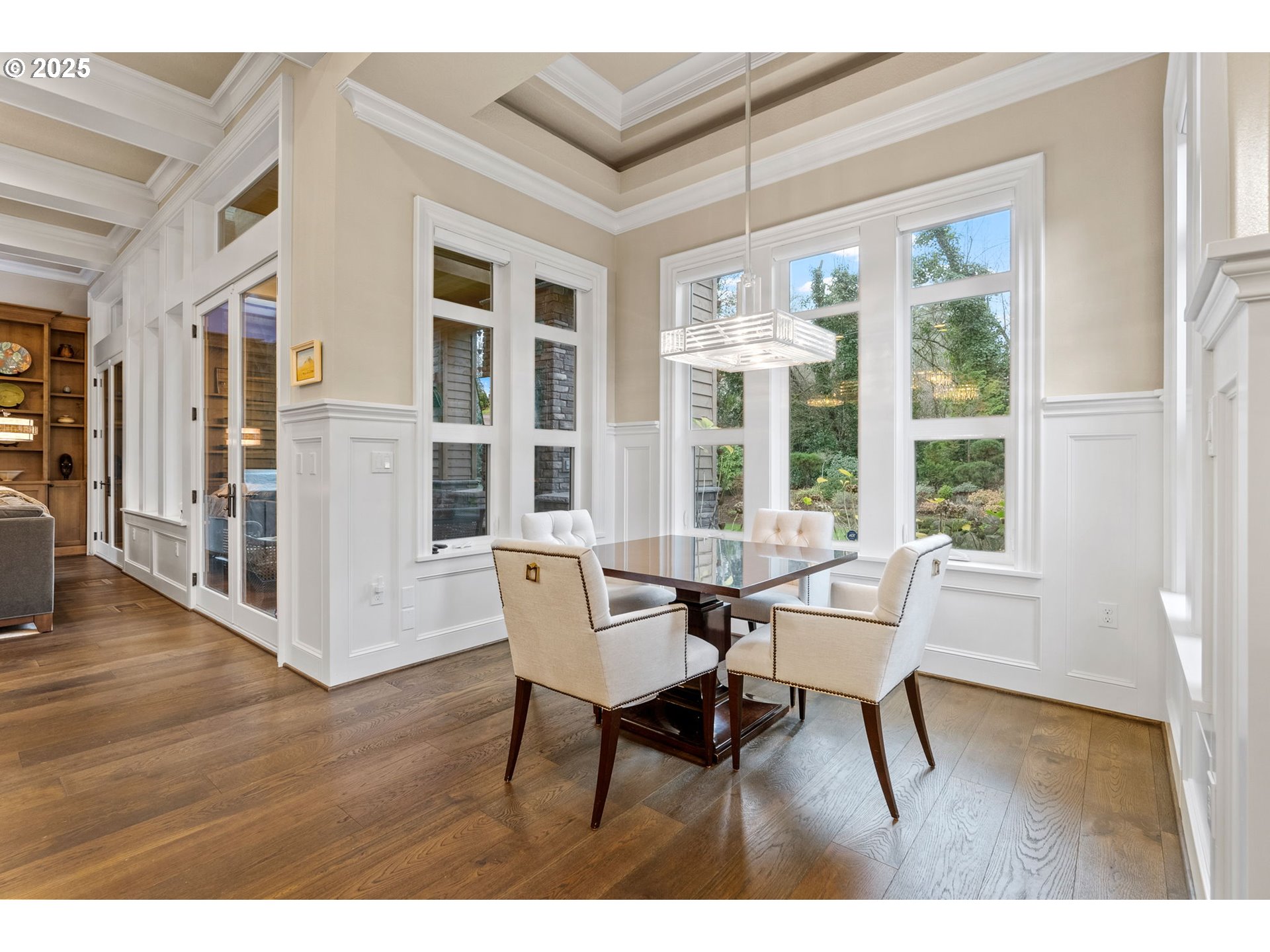 13710 Knaus Road Lake Oswego, OR 97034 - Photo 14 of 47 a view of a dining room with furniture and wooden floor