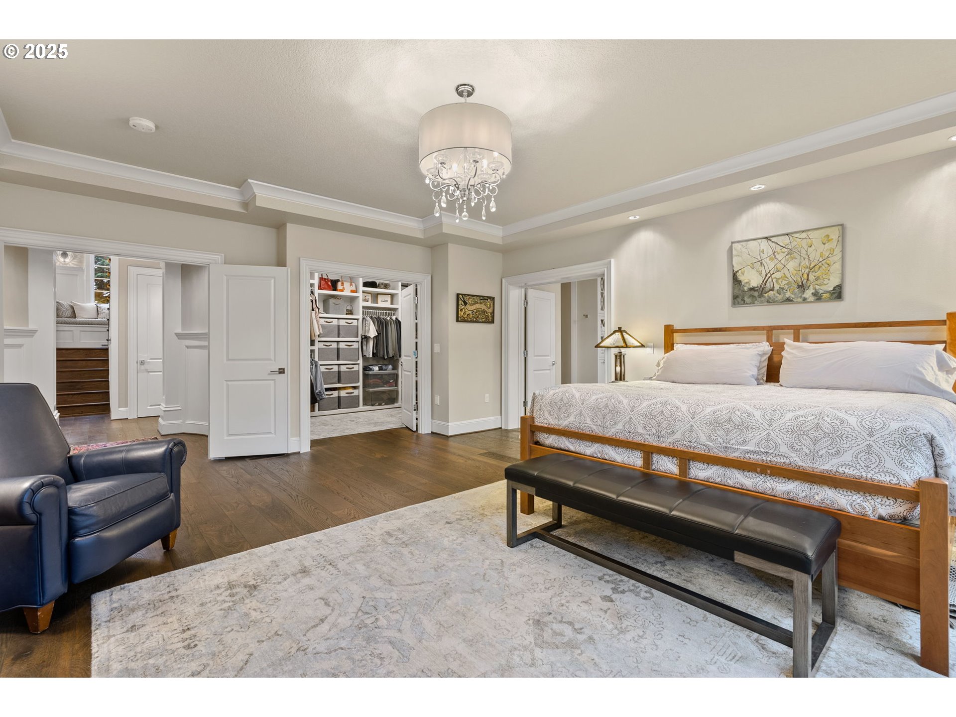 13710 Knaus Road Lake Oswego, OR 97034 - Photo 25 of 47 a spacious bedroom with a bed and furniture