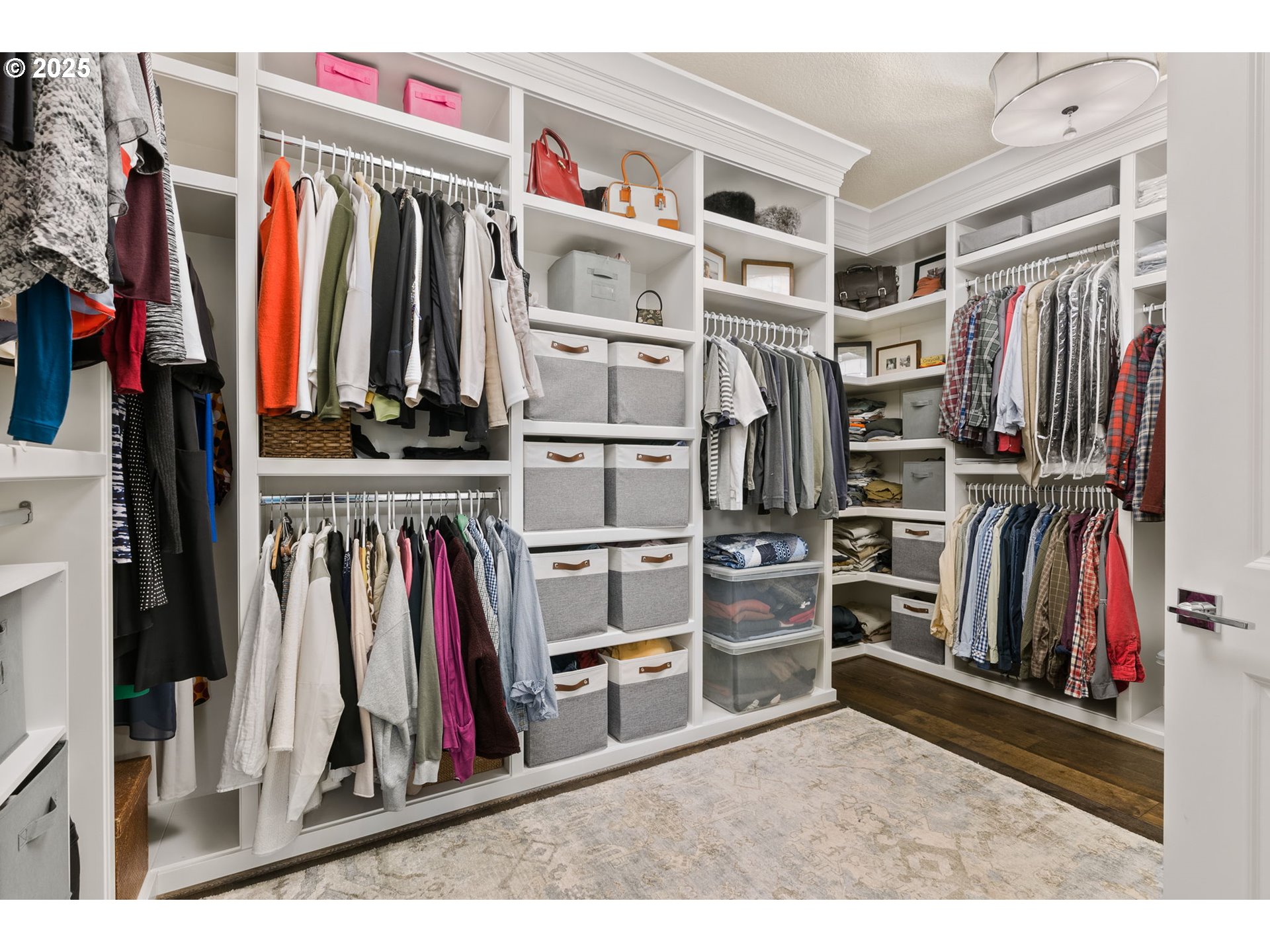 13710 Knaus Road Lake Oswego, OR 97034 - Photo 28 of 47 a view of walk in closet with clothes and shoes