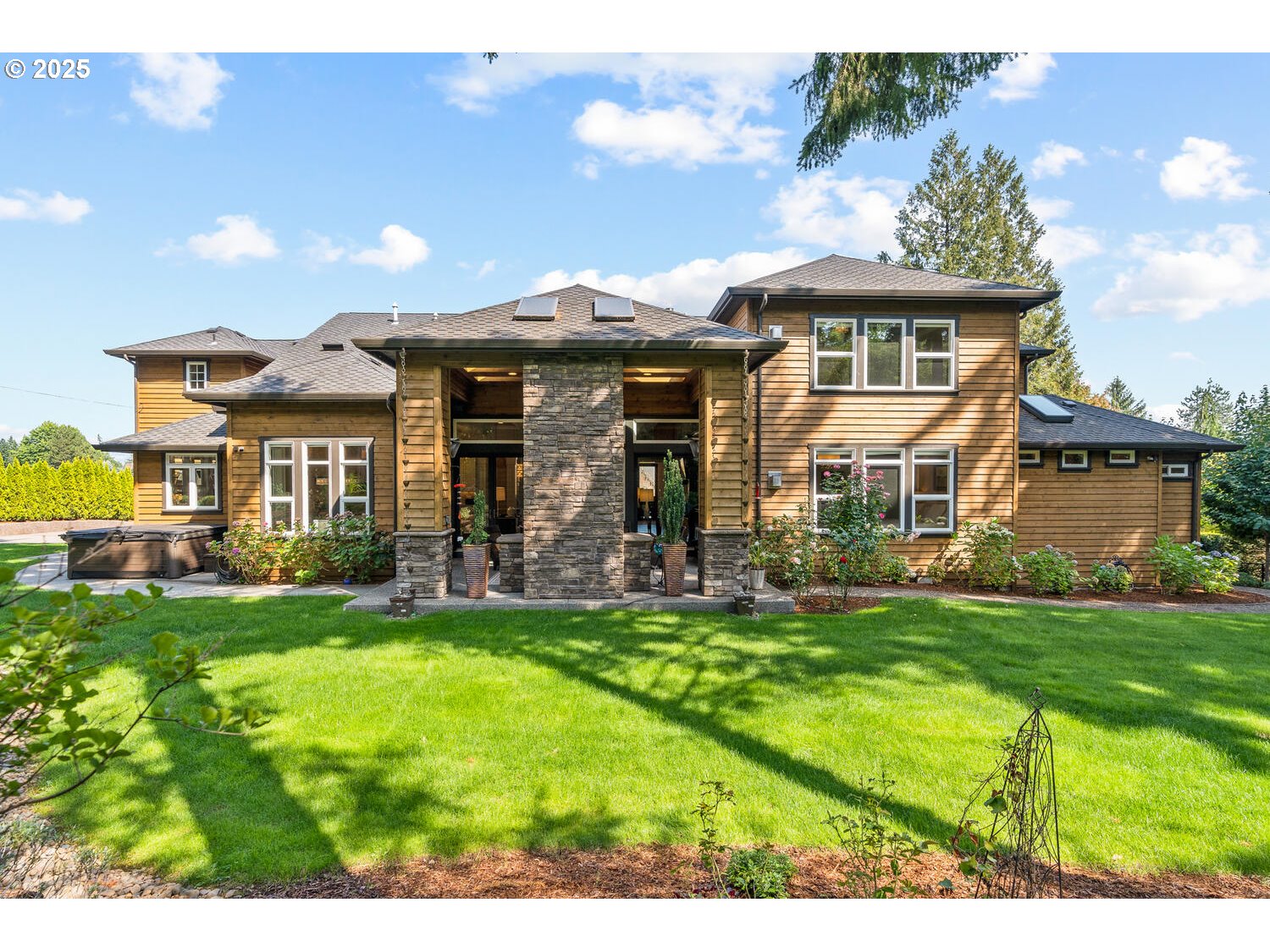 13710 Knaus Road Lake Oswego, OR 97034 - Photo 3 of 47 a front view of a house with a garden