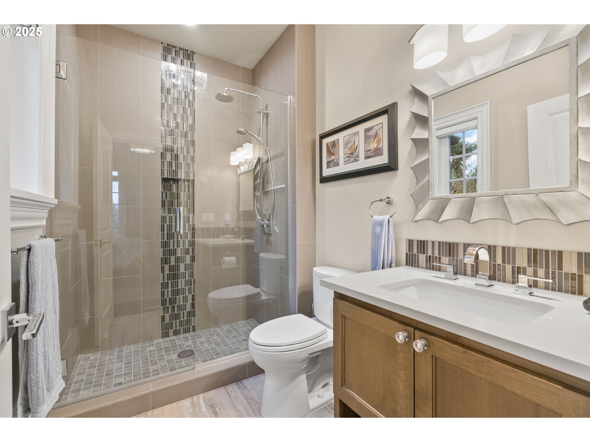 13710 Knaus Road Lake Oswego, OR 97034 - Photo 31 of 47 a bathroom with a sink a toilet and shower