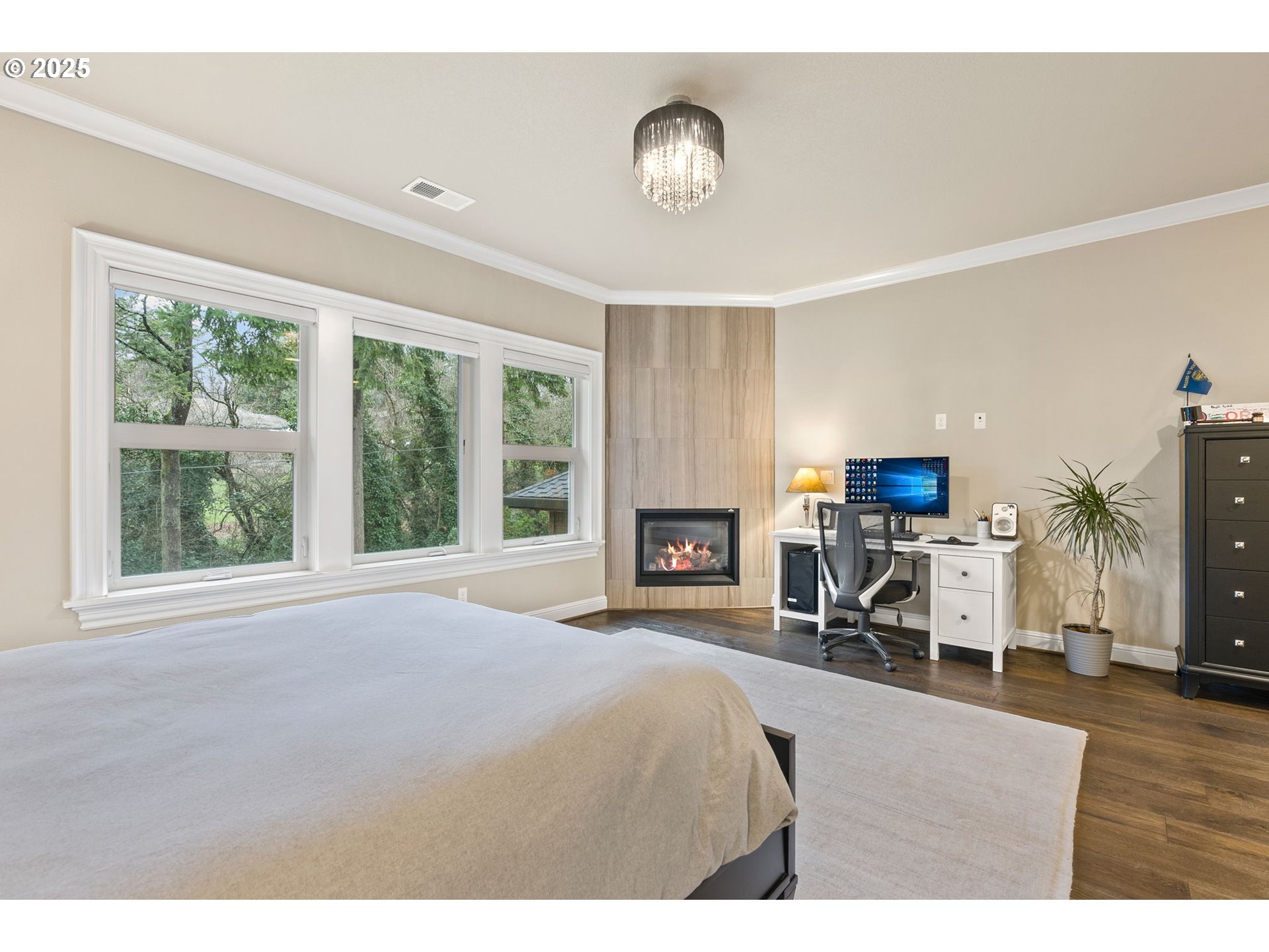 13710 Knaus Road Lake Oswego, OR 97034 - Photo 35 of 47 a bedroom with furniture a fireplace and a large window