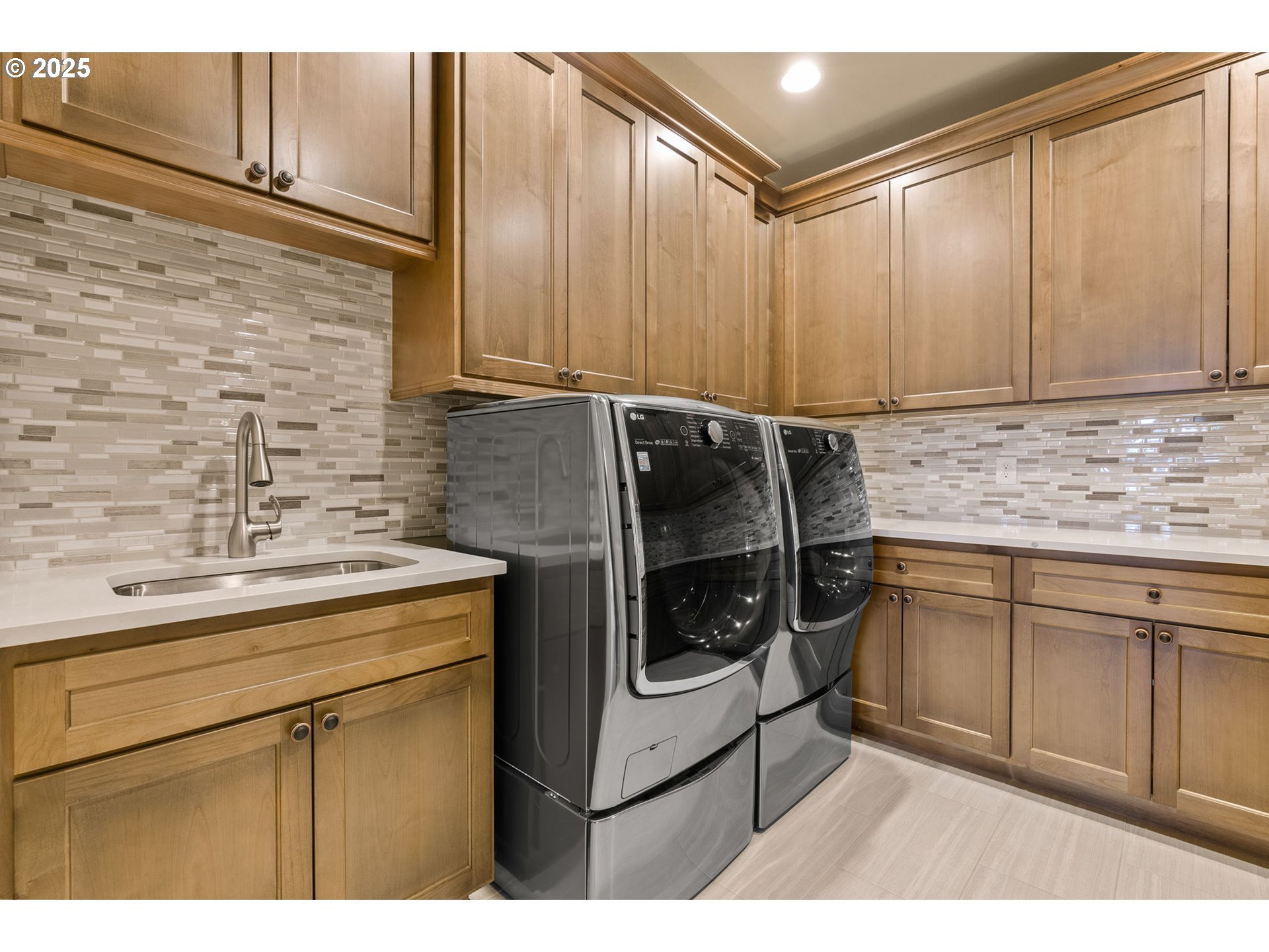 13710 Knaus Road Lake Oswego, OR 97034 - Photo 40 of 47 a kitchen with a stove cabinets and a sink