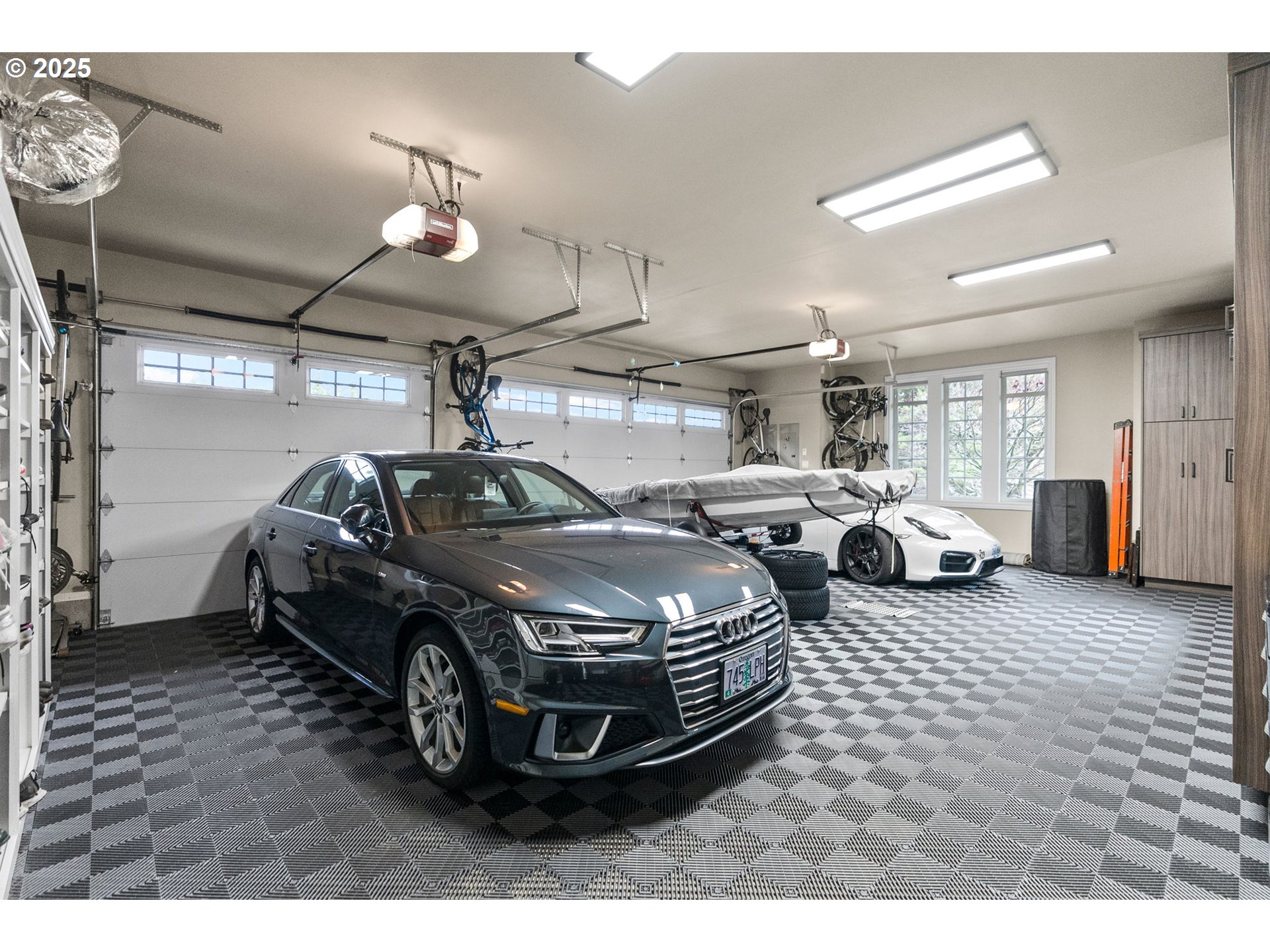 13710 Knaus Road Lake Oswego, OR 97034 - Photo 43 of 47 a car parked in a garage
