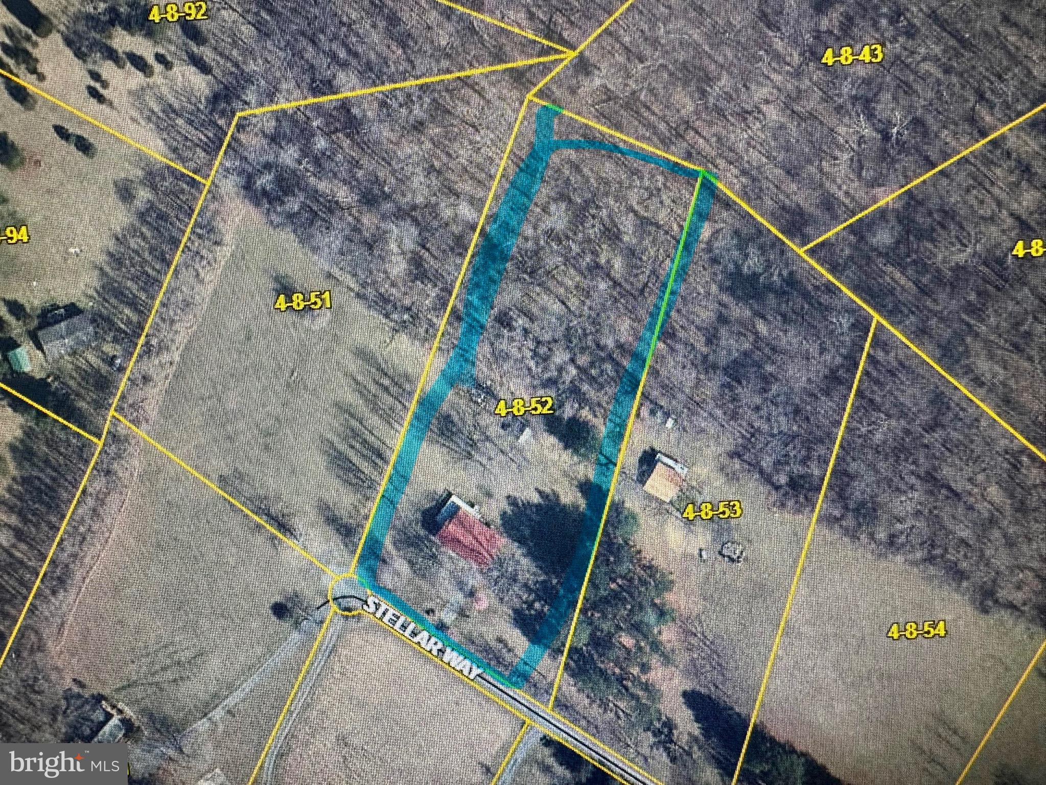 852 Stellar Way Great Cacapon, WV 25422 - Photo 2 of 7 a bird view of a backyard