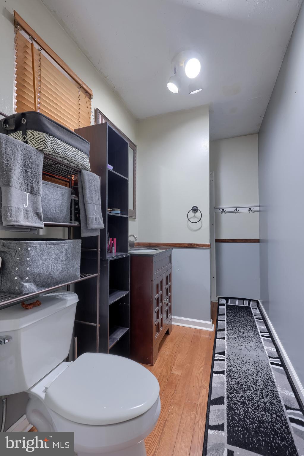 4131 Davidsburg Road Dover, PA 17315 - Photo 16 of 38 a bathroom with a toilet a sink and mirror