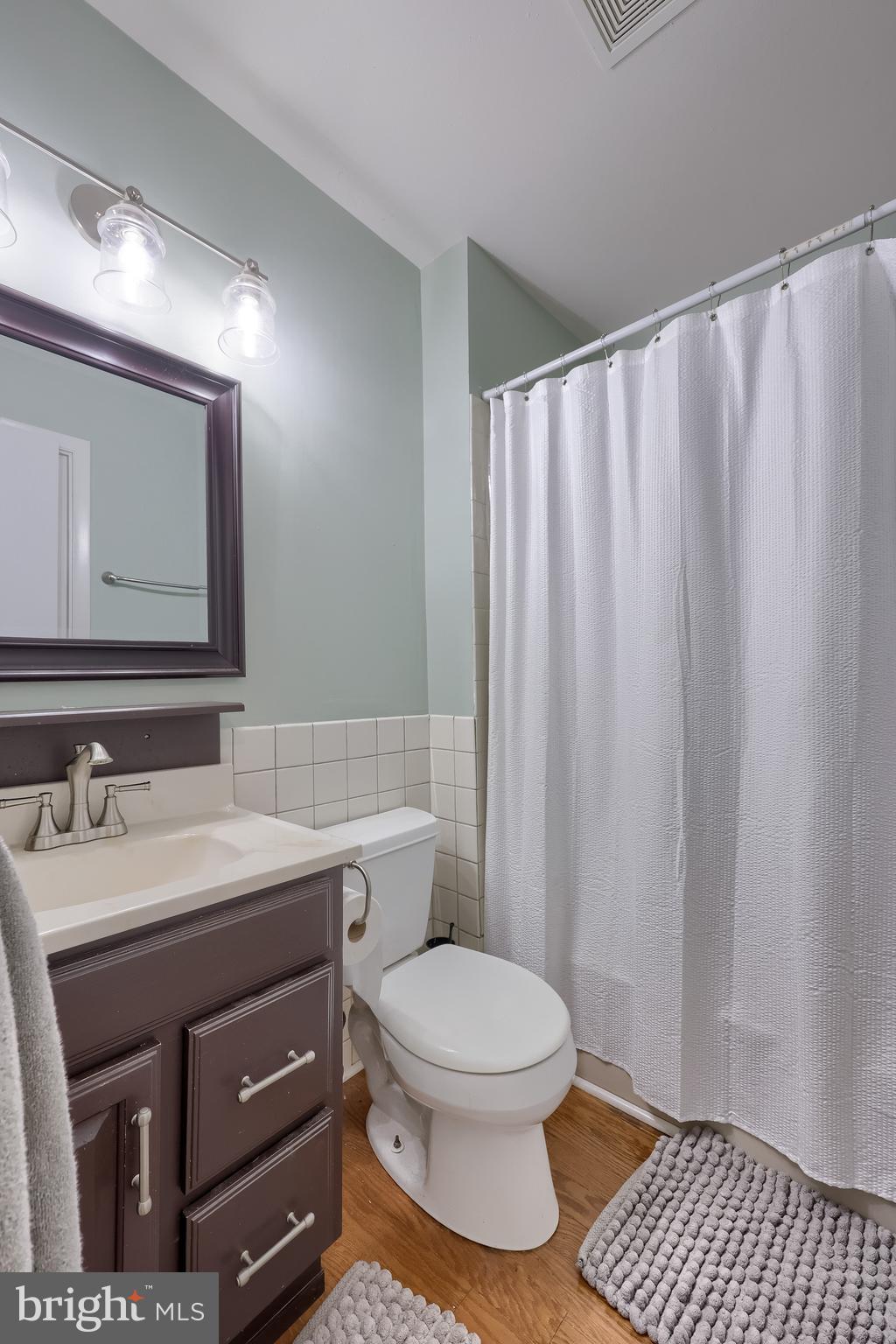 4131 Davidsburg Road Dover, PA 17315 - Photo 23 of 38 a bathroom with a sink a toilet and mirror