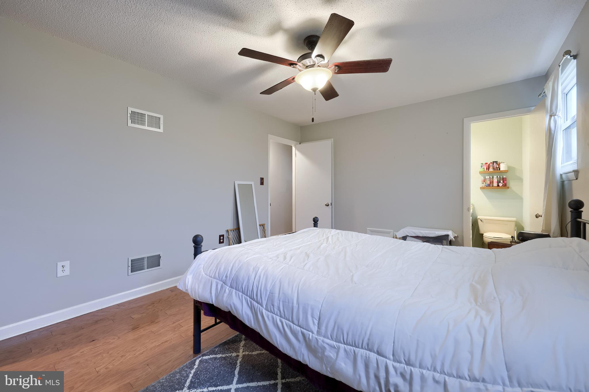 4131 Davidsburg Road Dover, PA 17315 - Photo 26 of 38 a bedroom with a bed and a ceiling fan