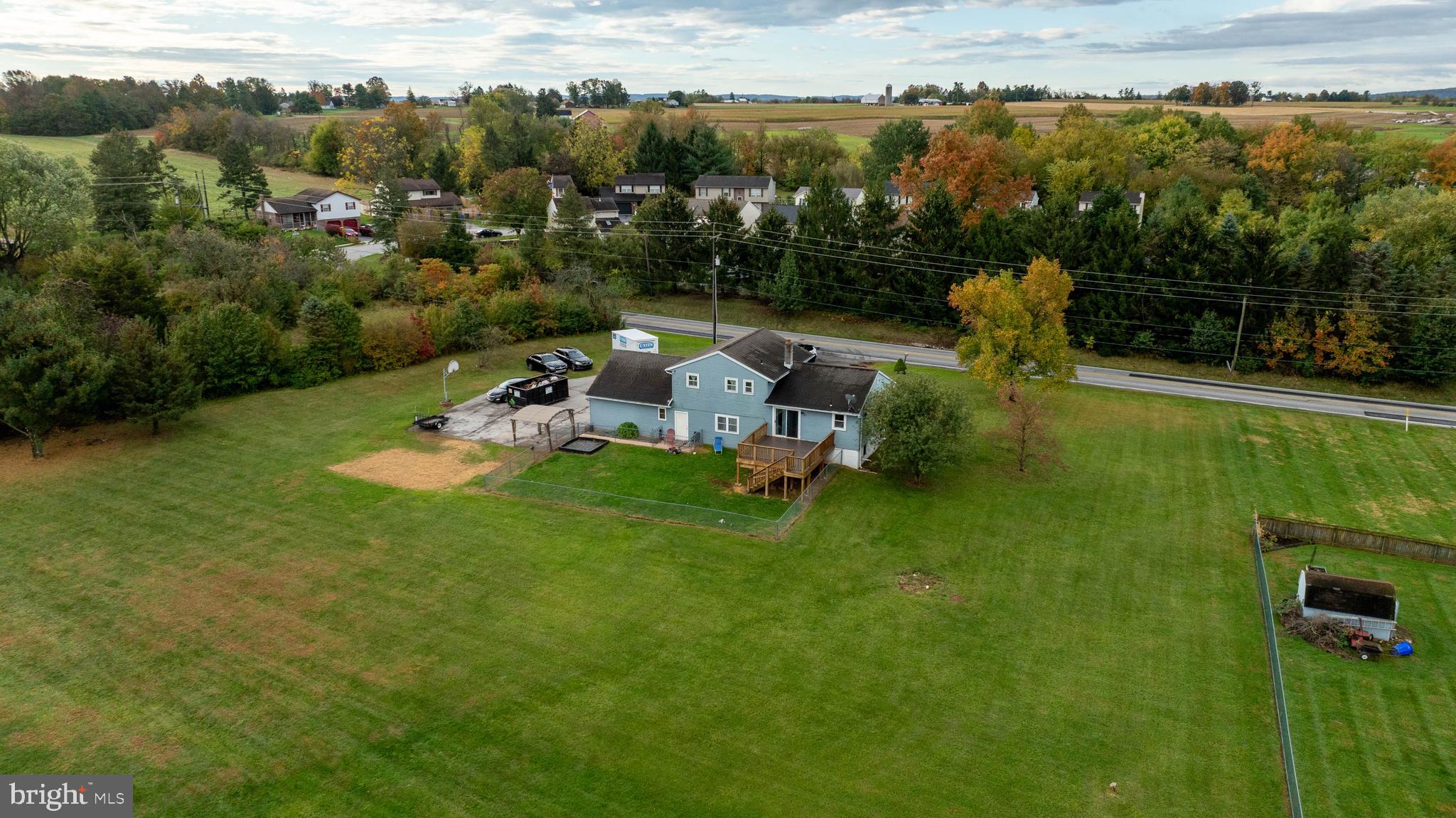 4131 Davidsburg Road Dover, PA 17315 - Photo 30 of 38 a view of a lake with a yard