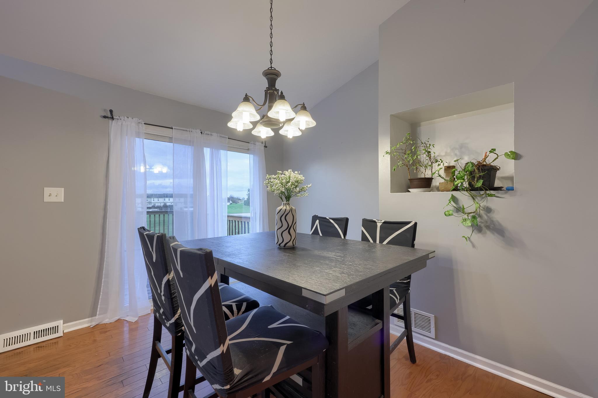 4131 Davidsburg Road Dover, PA 17315 - Photo 8 of 38 a view of a dining room with furniture and wooden floor