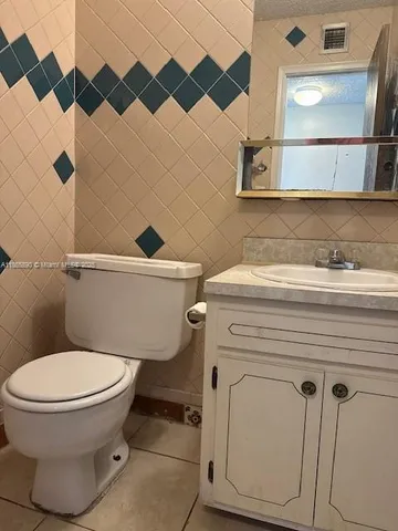 a view of a livingroom with a staircase