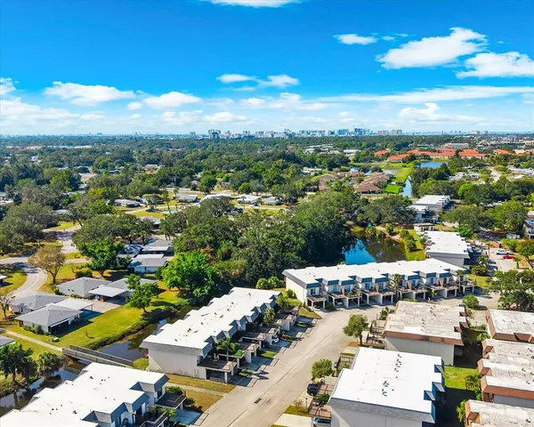 a view of a city with mountains in the background
