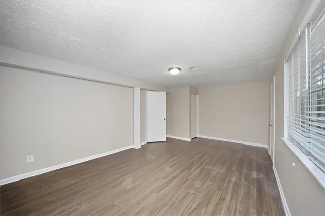 a view of backyard with tree