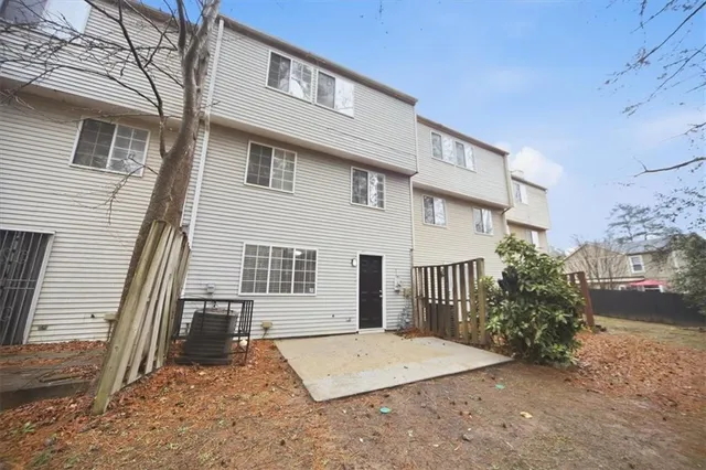 a front view of a house with a garage