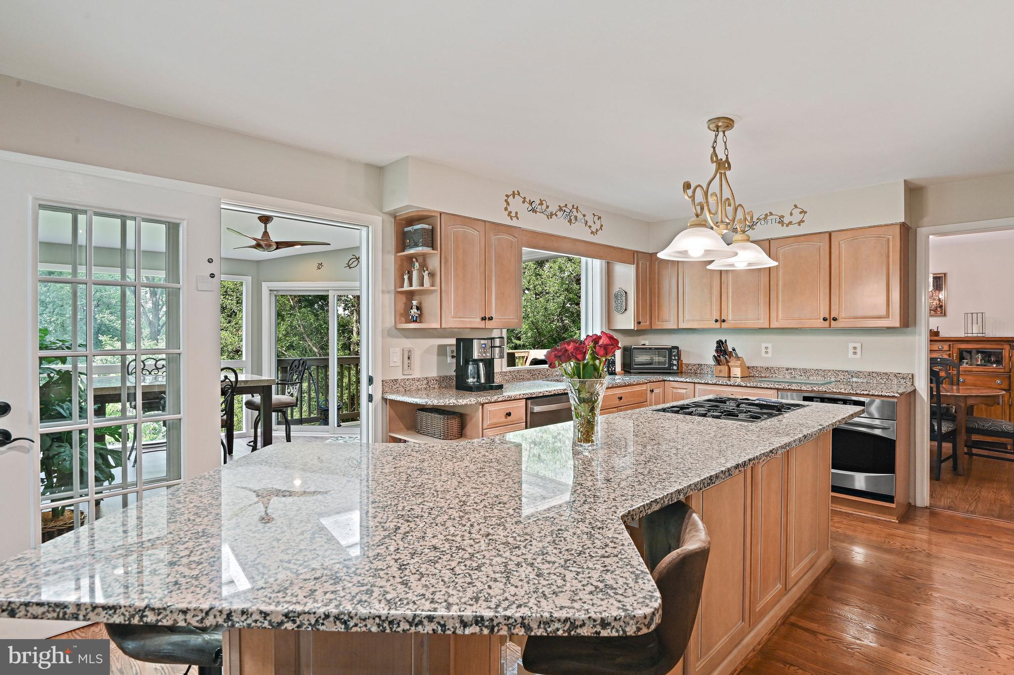 9830 Faust Drive Vienna, VA 22182 - Photo 17 of 75 Kitchen opens to the sun room