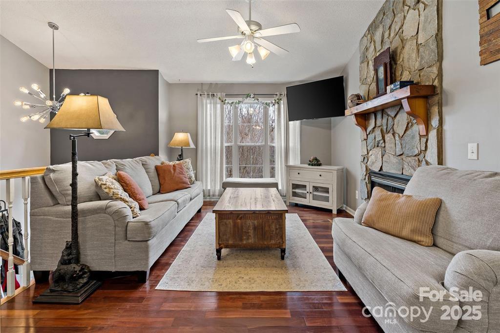 2691 Laurel Point Drive Nebo, NC 28761 - Photo 14 of 44 a living room with furniture and a flat screen tv