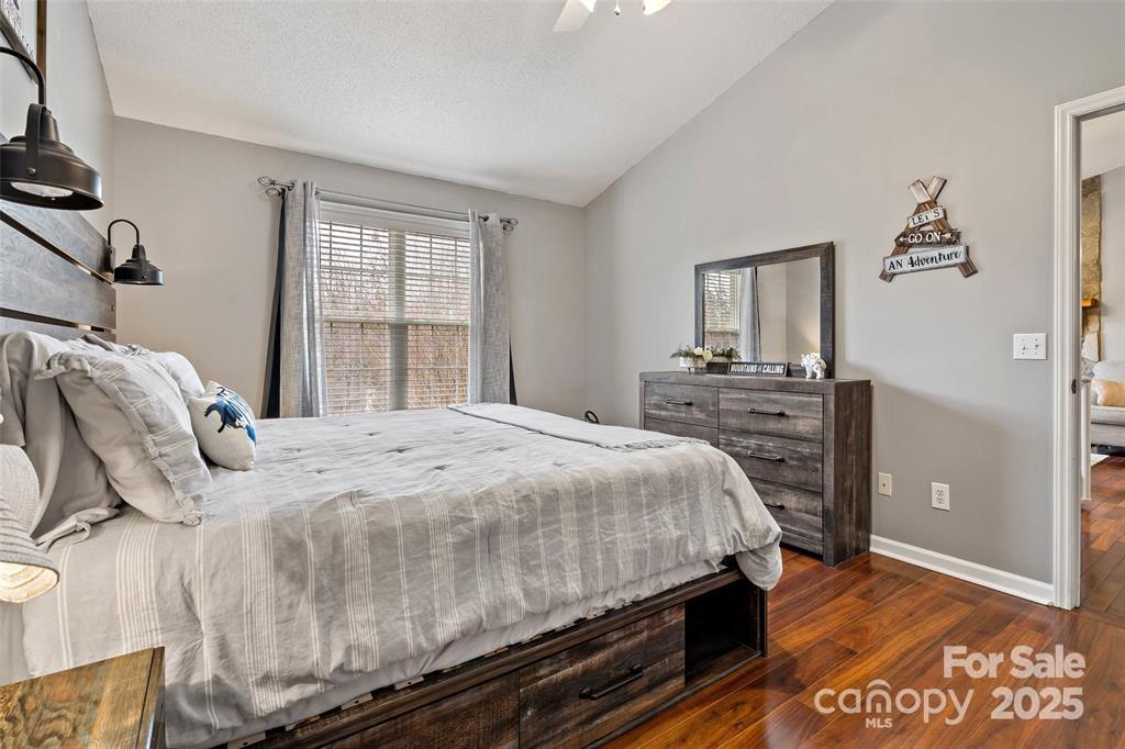 2691 Laurel Point Drive Nebo, NC 28761 - Photo 21 of 44 a bedroom with a bed and dresser