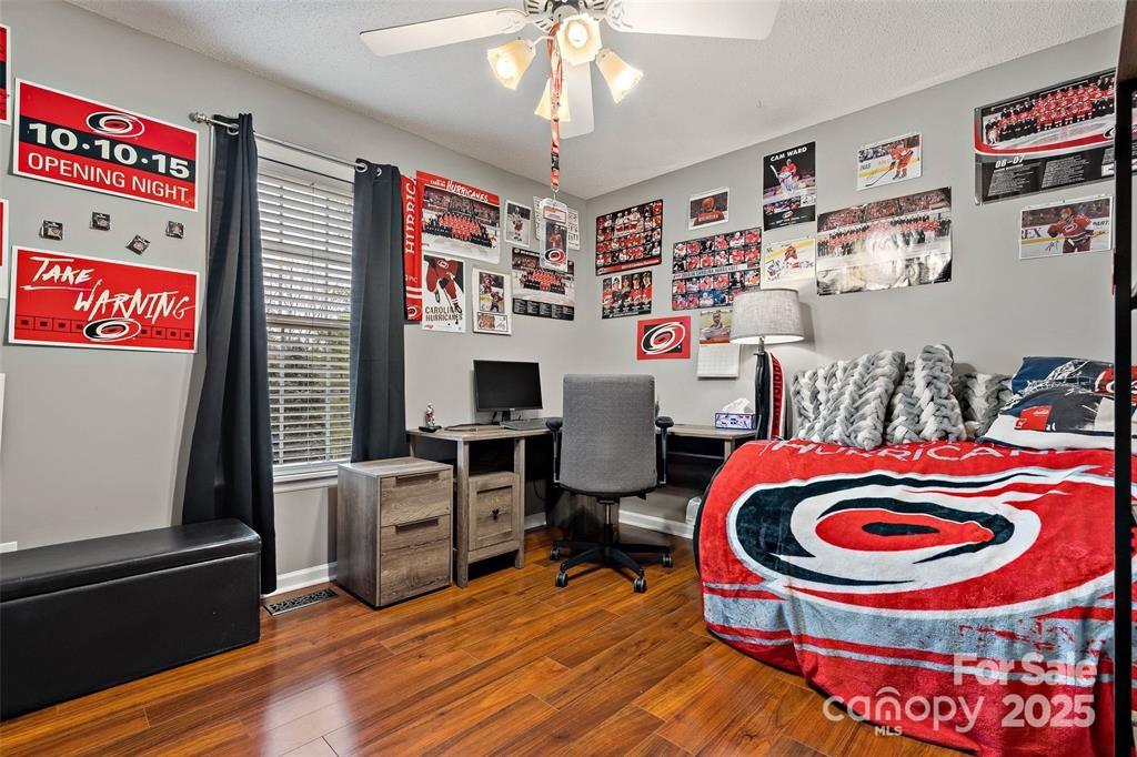 2691 Laurel Point Drive Nebo, NC 28761 - Photo 24 of 44 a living room with furniture and a flat screen tv