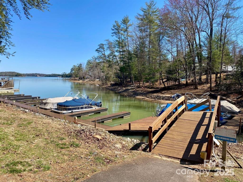 2691 Laurel Point Drive Nebo, NC 28761 - Photo 44 of 44 a view of a lake with a table and chairs