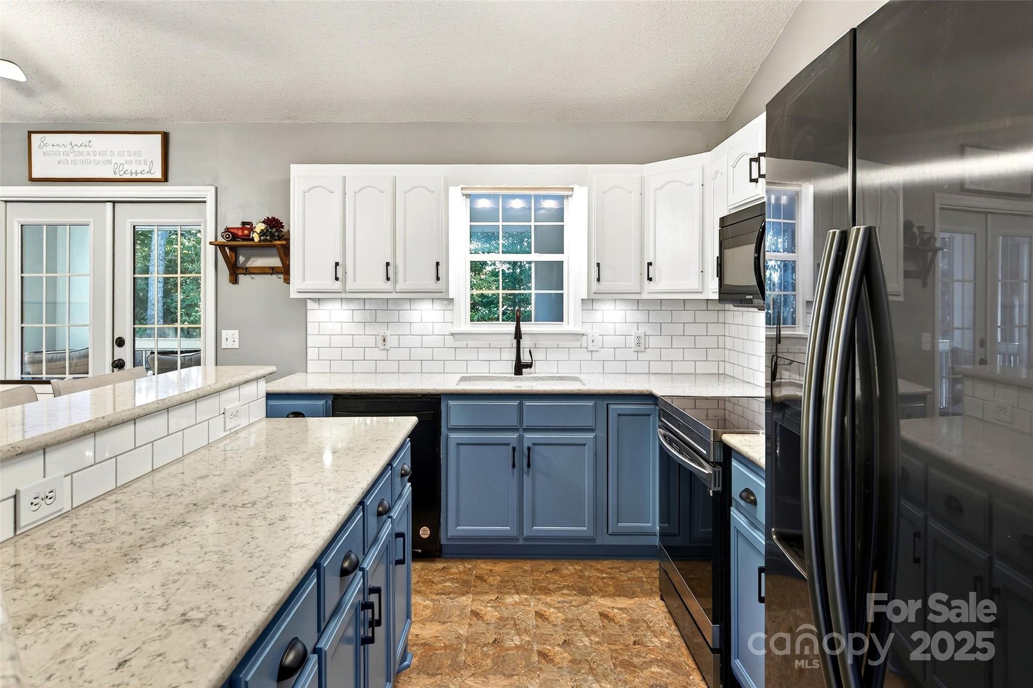 2691 Laurel Point Drive Nebo, NC 28761 - Photo 5 of 44 a kitchen with stainless steel appliances granite countertop a sink stove and refrigerator