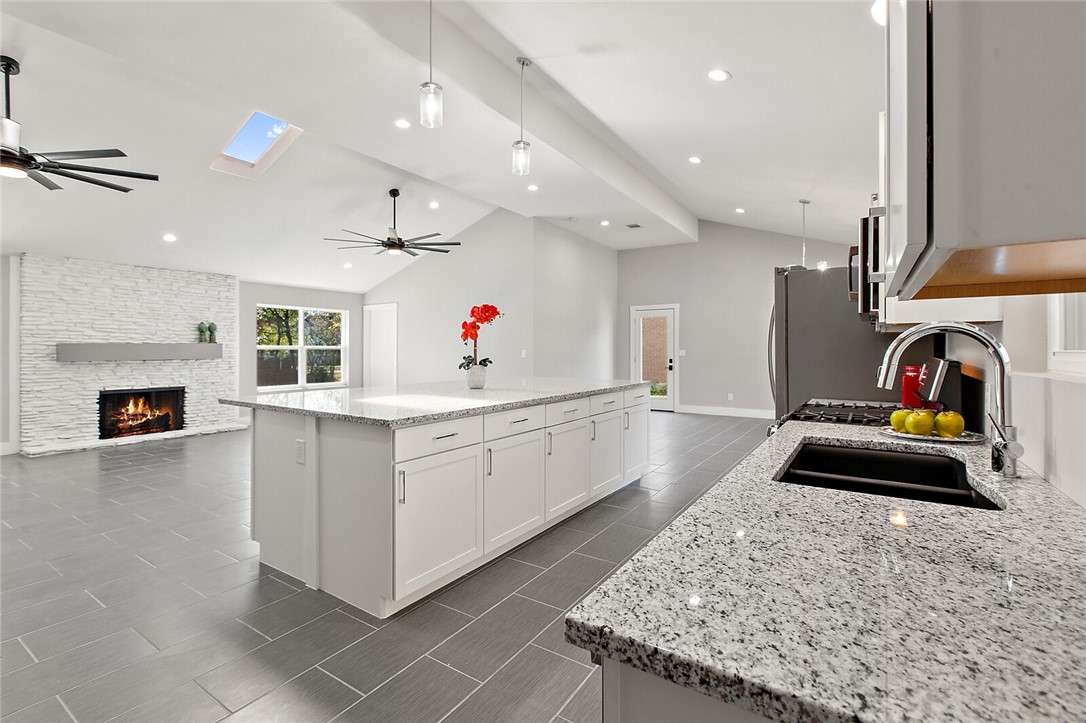 a room with furniture and a fireplace