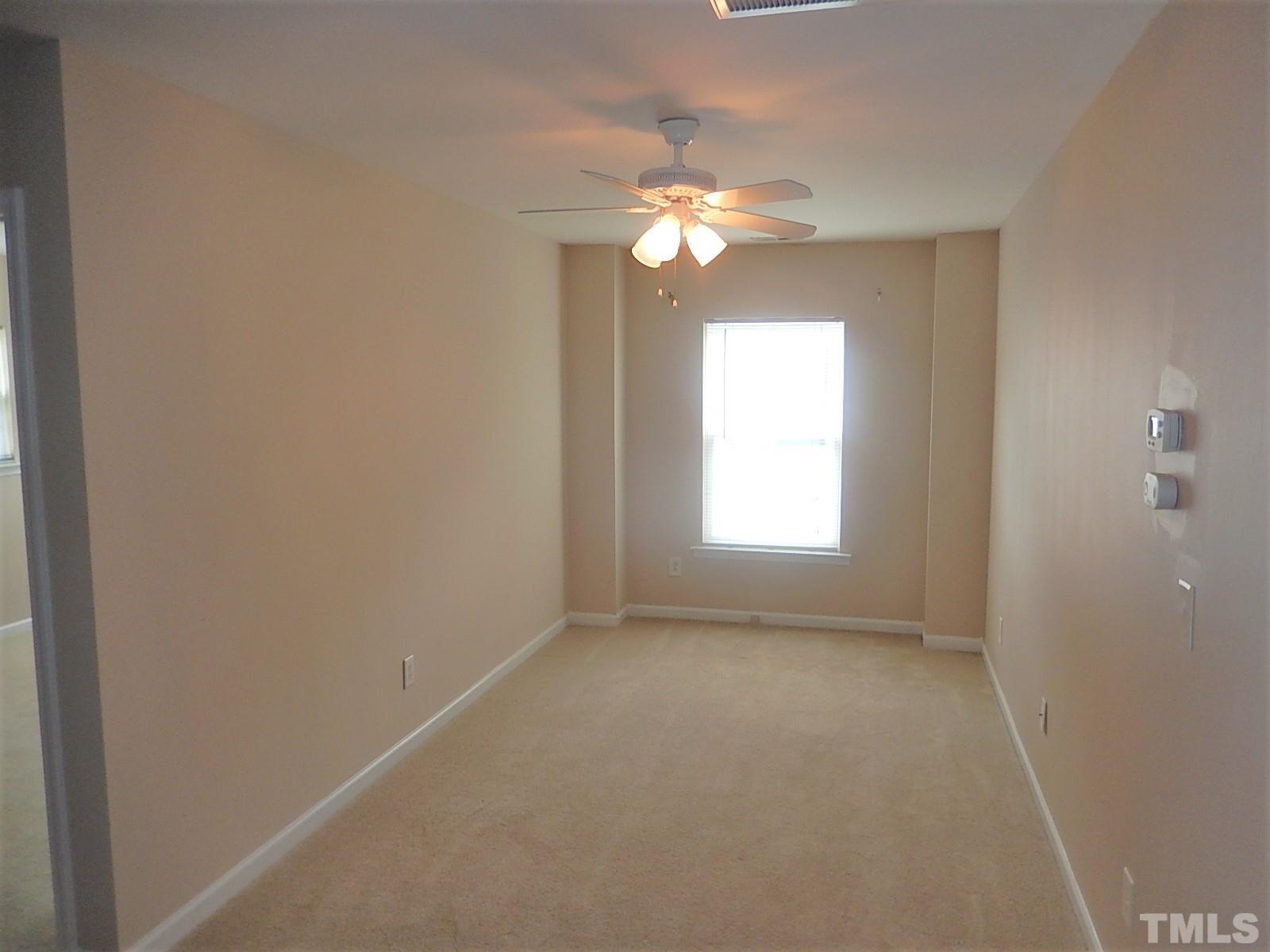 101 Olvera Way Holly Springs, NC 27540 - Photo 15 of 25 a view of empty room with window
