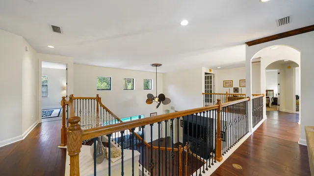 a view of a backyard with swimming pool