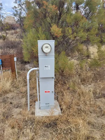 a view of a yard with a mountain