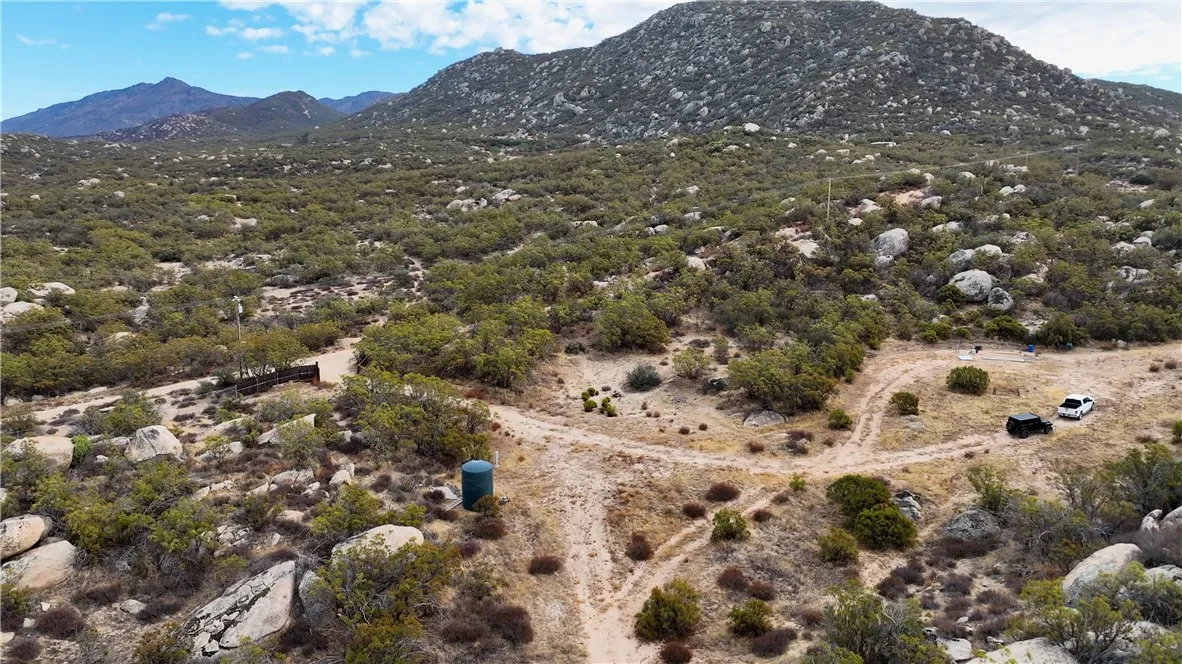 12 Sycamore Spring Road Jamul, CA 91935 - Photo 4 of 21 a view of a mountain in the distance in a field