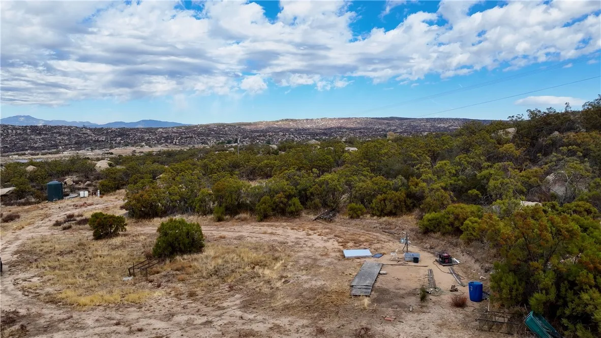 12 Sycamore Spring Road Jamul, CA 91935 - Photo 10 of 21 a view of a dry yard with lots of trees