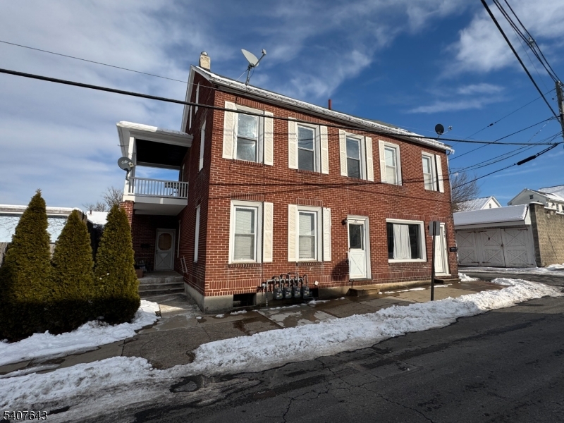 27 Filmore Street Phillipsburg, NJ 08865 - Photo 1 of 15 a front view of a house with yard