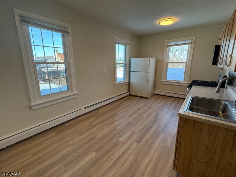 27 Filmore Street Phillipsburg, NJ 08865 - Photo 2 of 15 a view of a room with wooden floor and a window