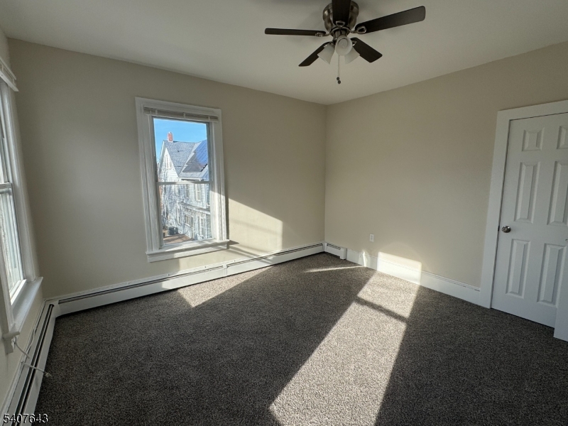 27 Filmore Street Phillipsburg, NJ 08865 - Photo 4 of 15 a view of an empty room with a window