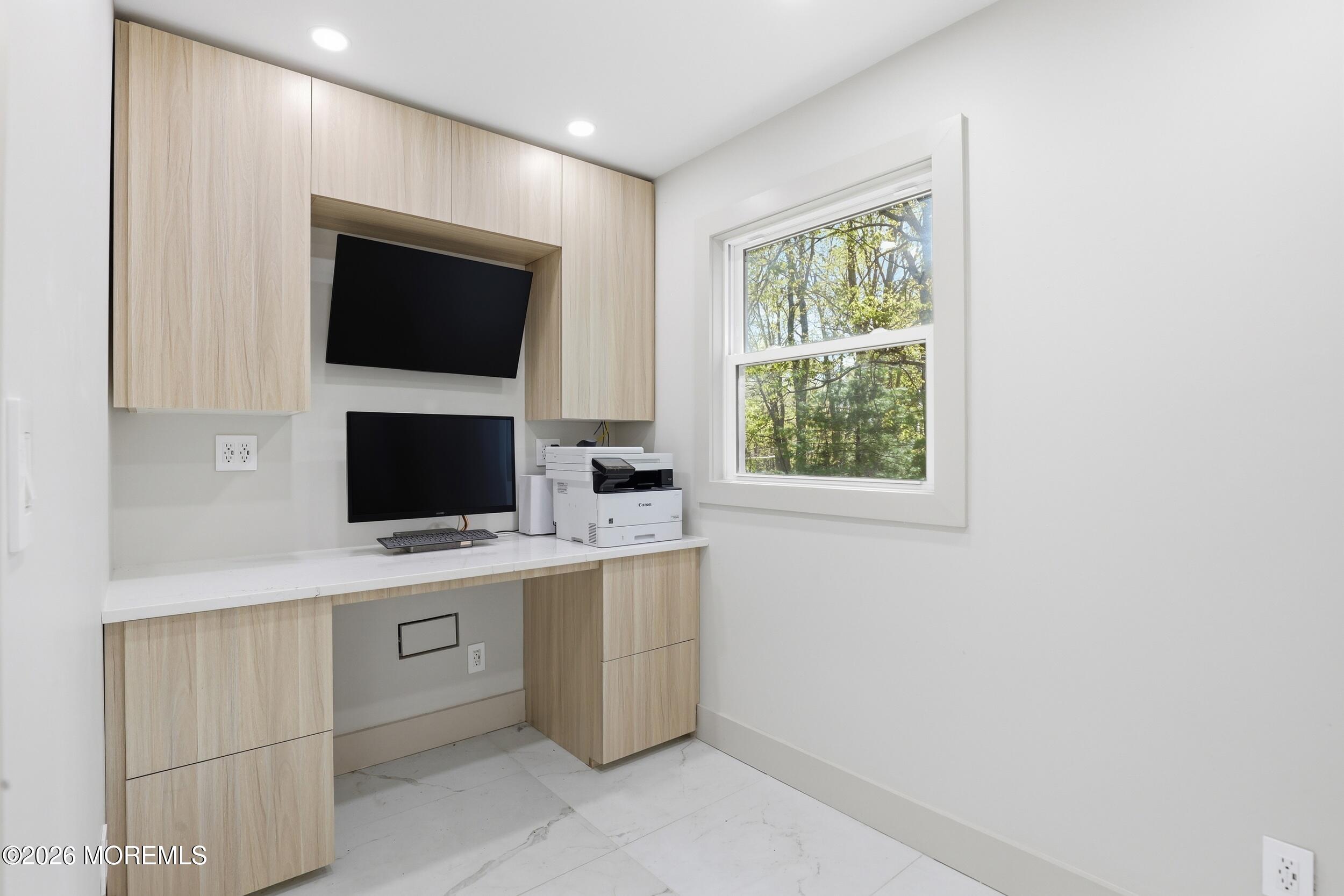 492 Cobain Road Jackson, NJ 08527 - Photo 26 of 47 a view of a television and a window in a room