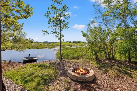 a view of a lake with a yard