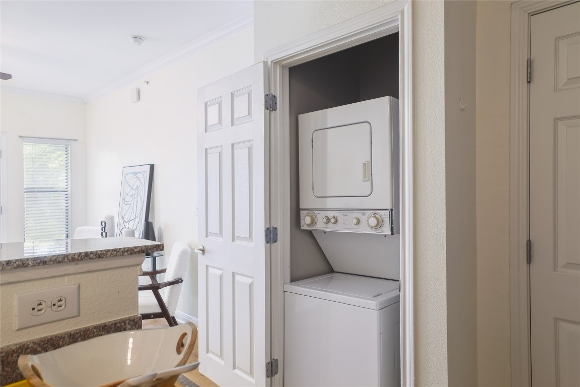 2502 Leon Street, Unit 208 Austin, TX 78705 - Photo 11 of 19 a bathroom with a toilet sink and mirror