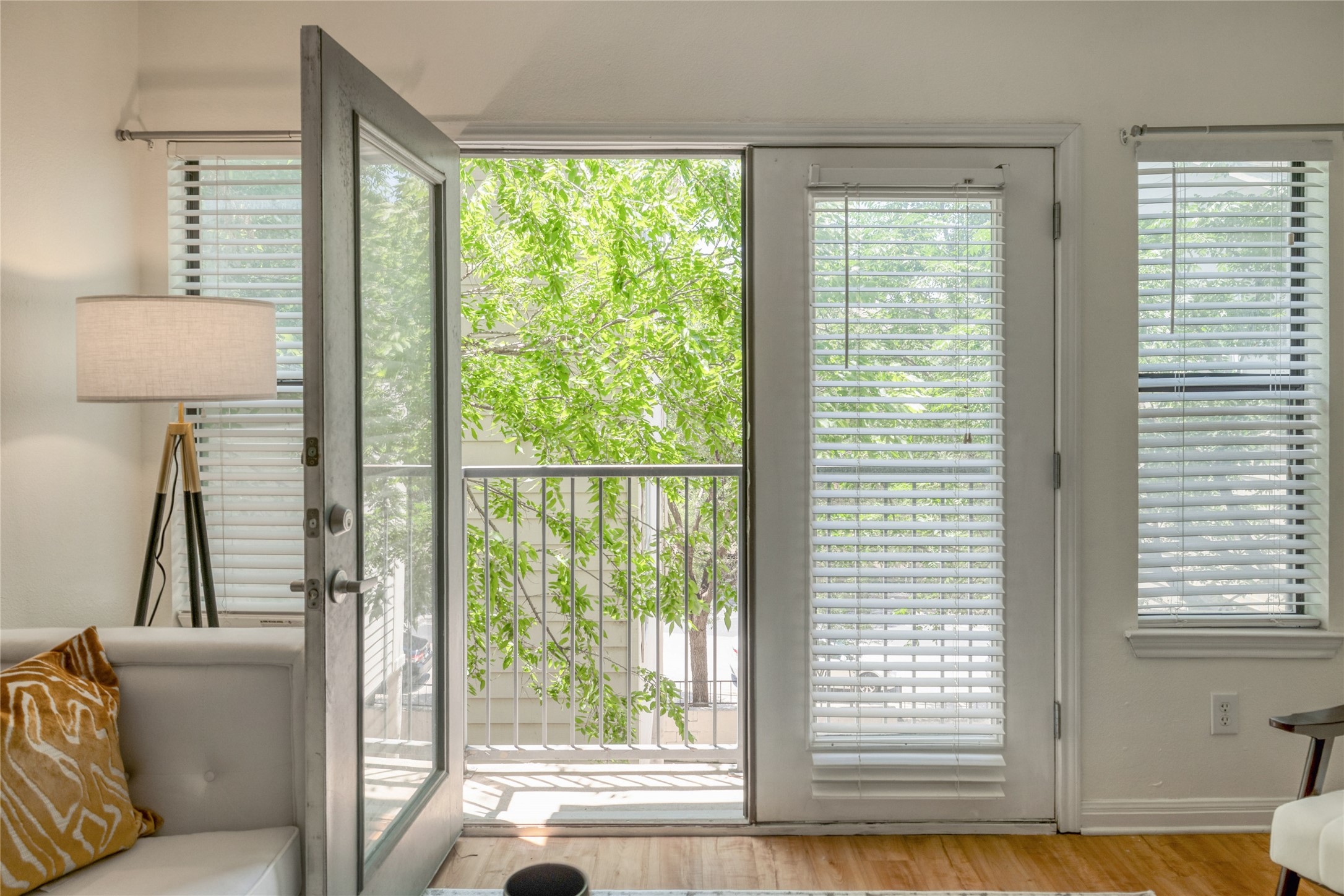 2502 Leon Street, Unit 208 Austin, TX 78705 - Photo 5 of 19 The private balcony is your perfect escape, offering a quiet spot to sip your morning coffee or unwind with a view after a busy day