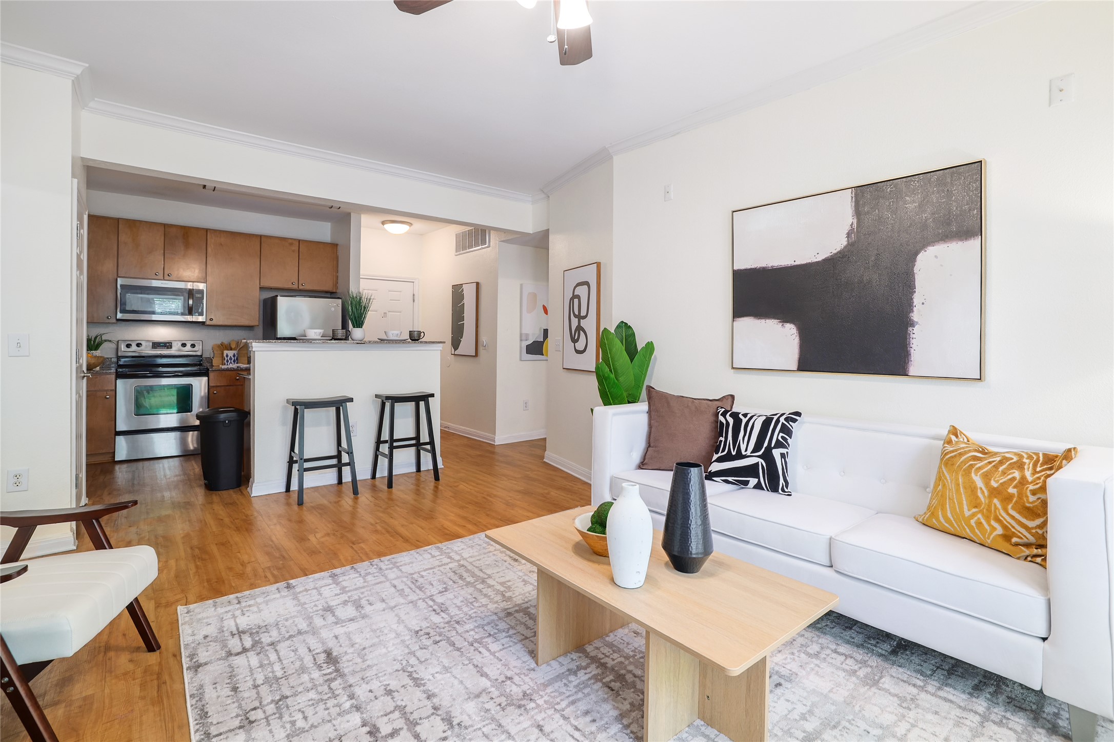 2502 Leon Street, Unit 208 Austin, TX 78705 - Photo 6 of 19 It’s not just a living room; it’s a place that adapts to you, whether you’re hosting game night, reading a book, or simply soaking in the light