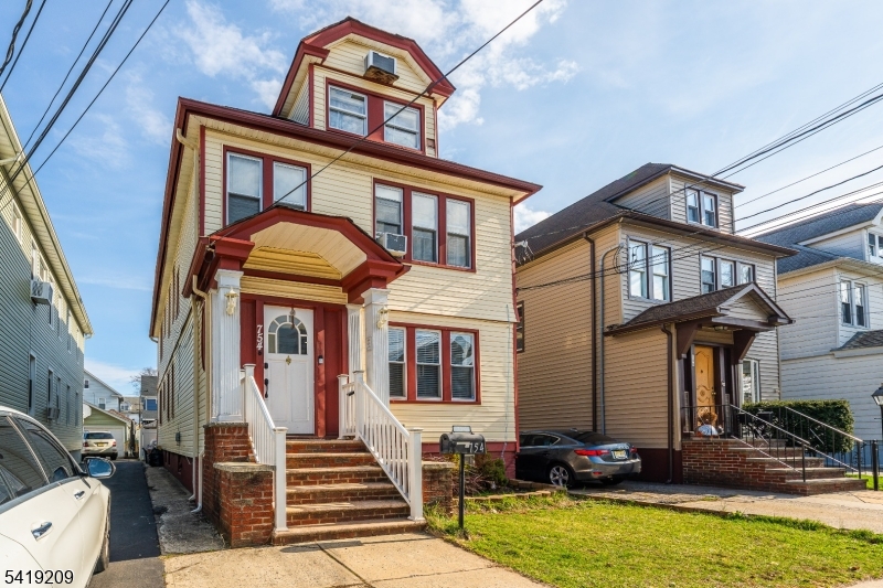 a front view of a house with a porch