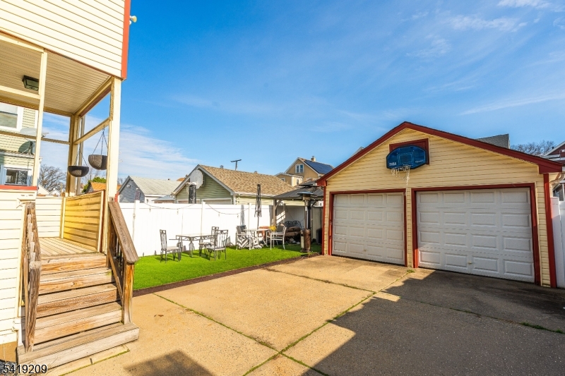 752 Eaton Street Elizabeth, NJ 07202 - Photo 21 of 27 a view of a house with a yard