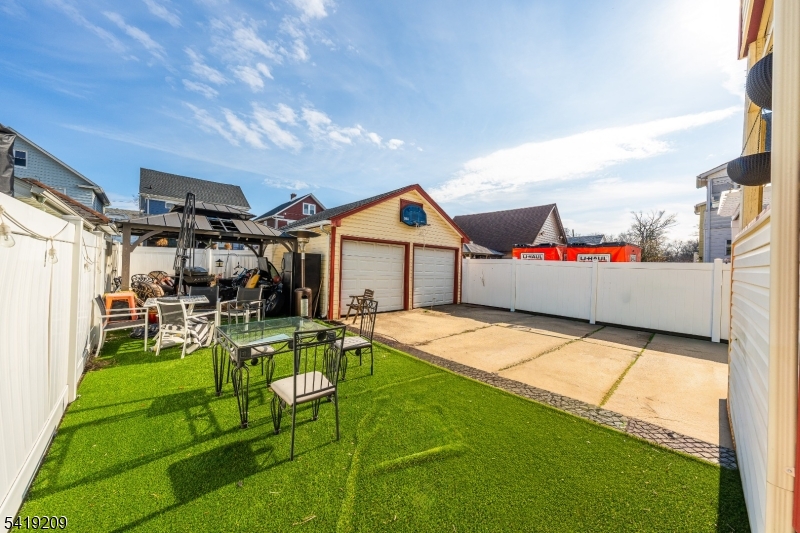 752 Eaton Street Elizabeth, NJ 07202 - Photo 22 of 27 a view of an house with backyard porch and sitting area