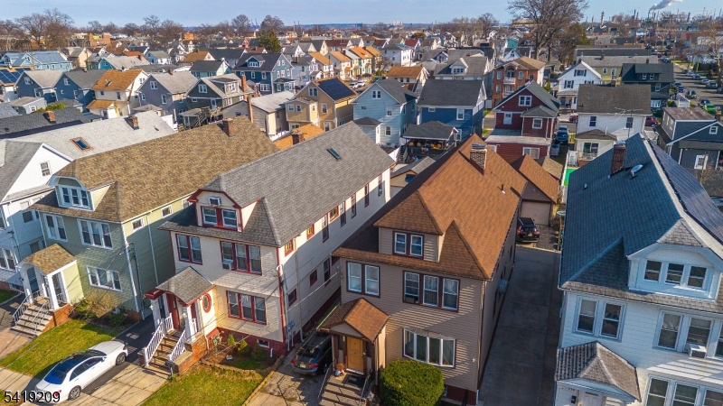 752 Eaton Street Elizabeth, NJ 07202 - Photo 23 of 27 an aerial view of residential houses with outdoor space