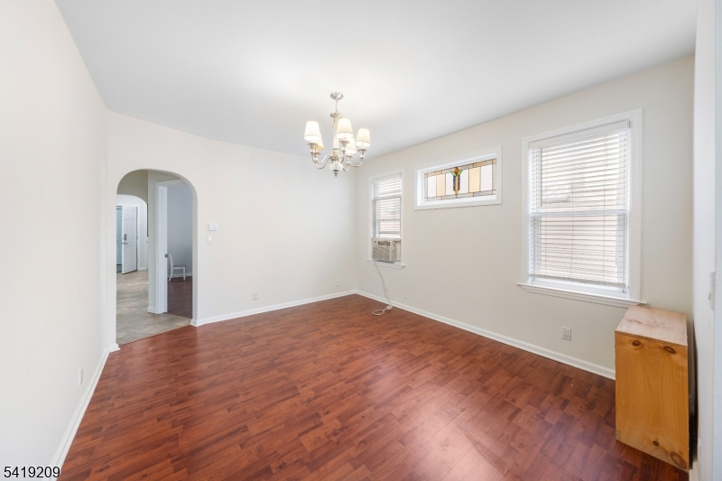 752 Eaton Street Elizabeth, NJ 07202 - Photo 9 of 27 a view of a windows and chandelier in a room