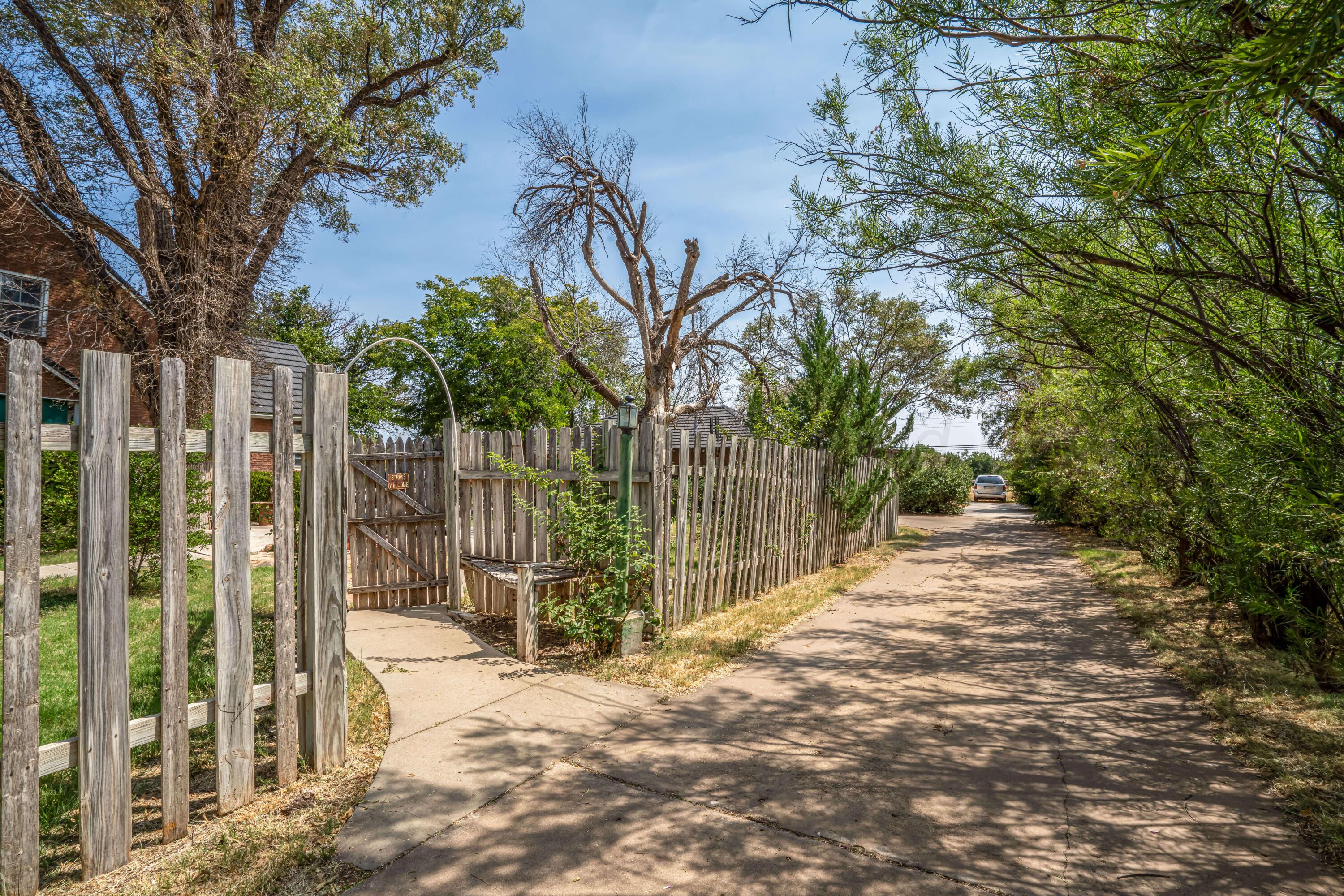 4809 Arden Road Amarillo, TX 79110 - Photo 8 of 34 a view of a backyard of the house