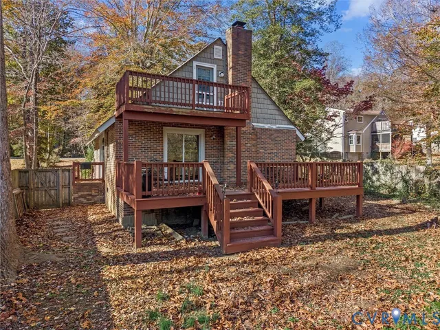 a view of a balcony with furniture