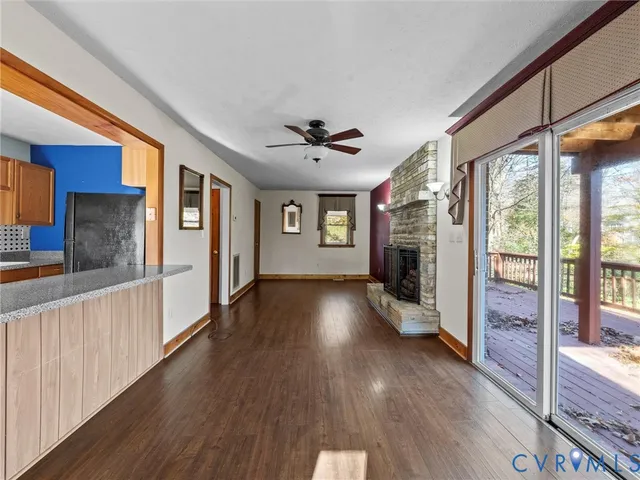 a view of fireplace with wooden floor