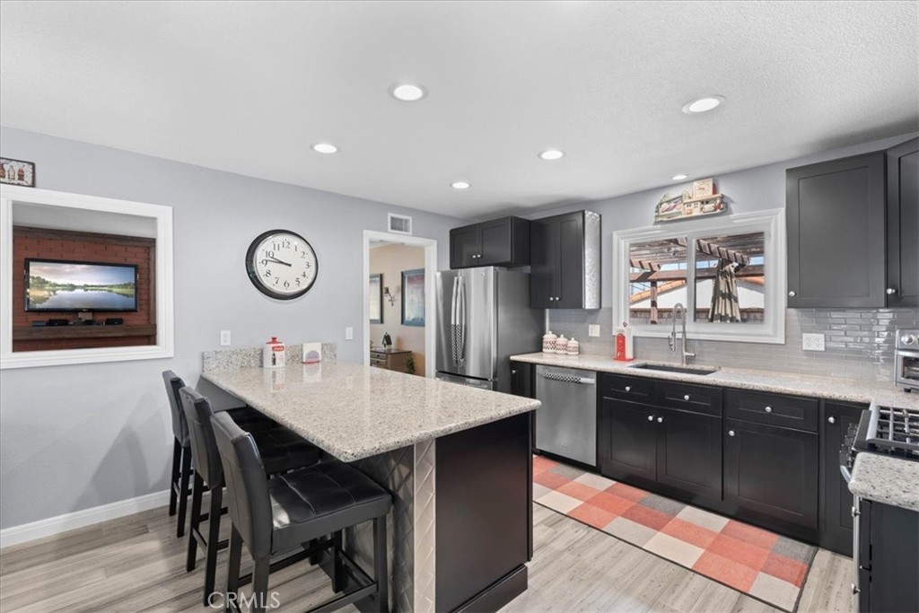 6213 Academy Avenue Riverside, CA 92506 - Photo 9 of 38 Remodeled Kitchen with Breakfast Counter