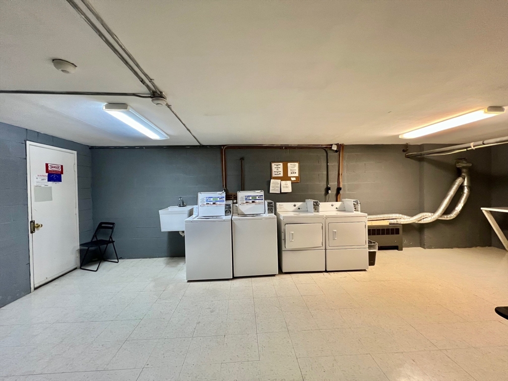 95 Maple Street, Unit 18 Malden, MA 02148 - Photo 22 of 24 a room with storage and utility