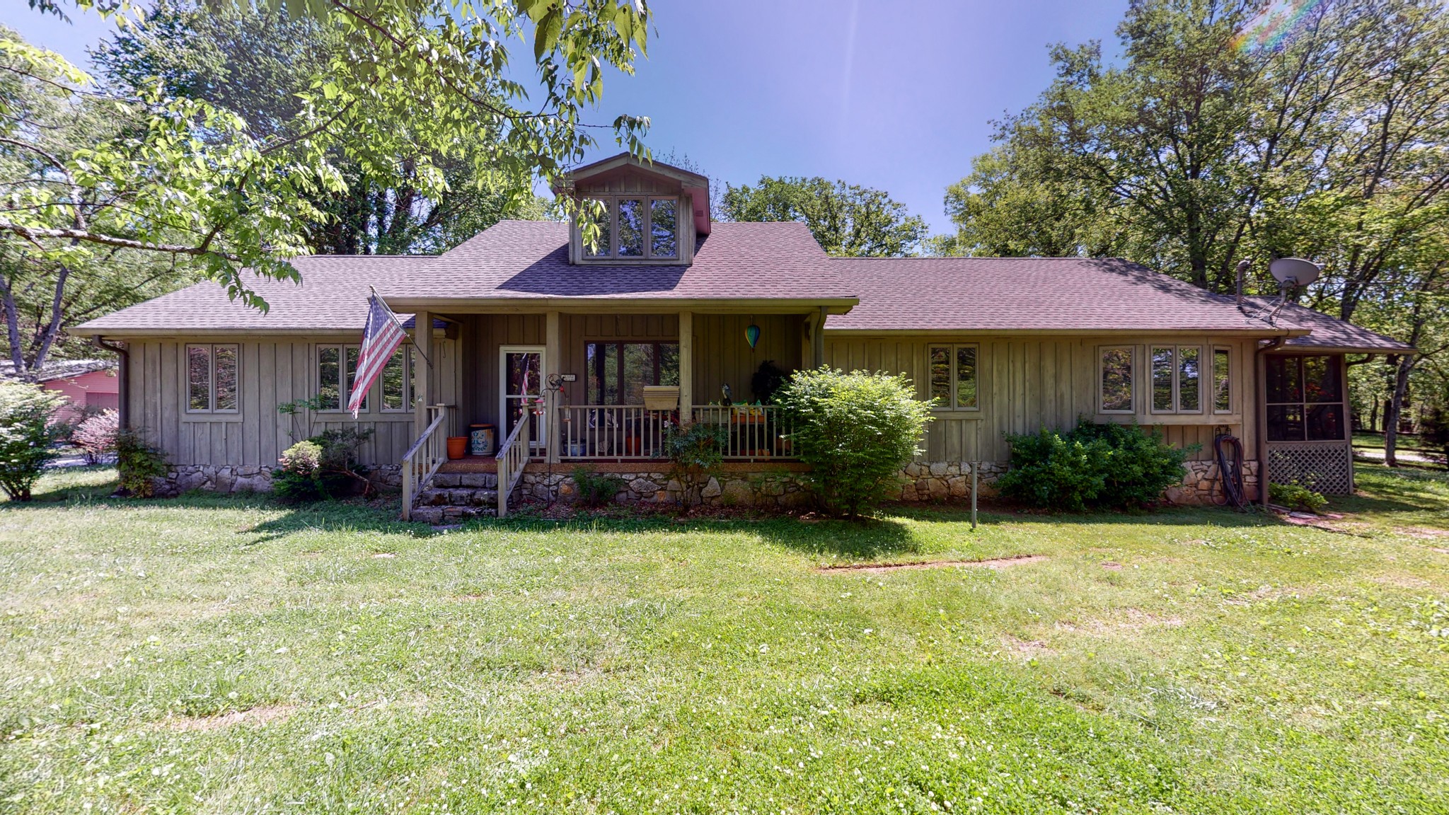 7707 Murfreesboro Road Lebanon, TN 37090 - Photo 1 of 45 a view of a house with a yard potted plants and a tree