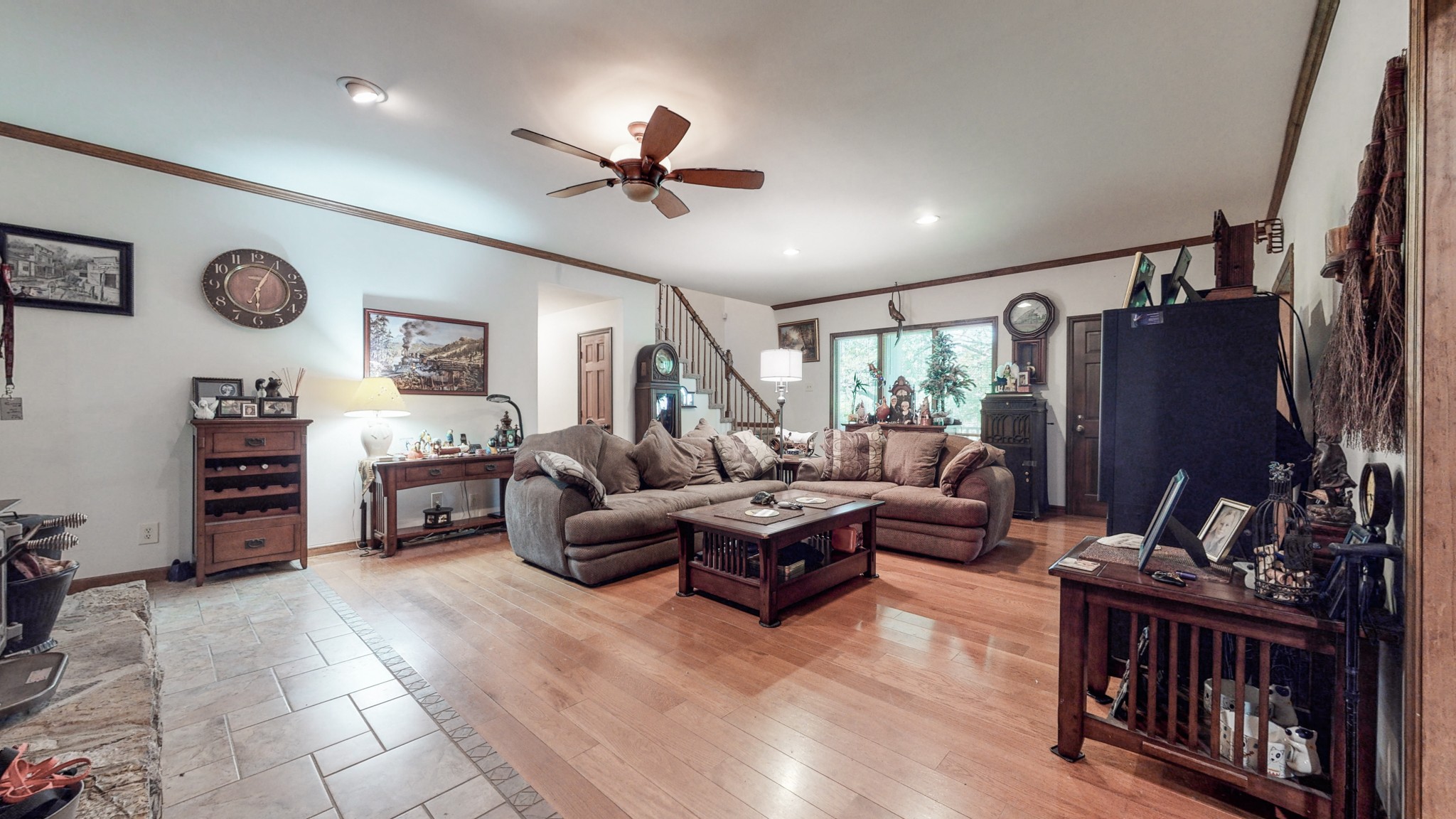 7707 Murfreesboro Road Lebanon, TN 37090 - Photo 12 of 45 a living room with furniture and a flat screen tv
